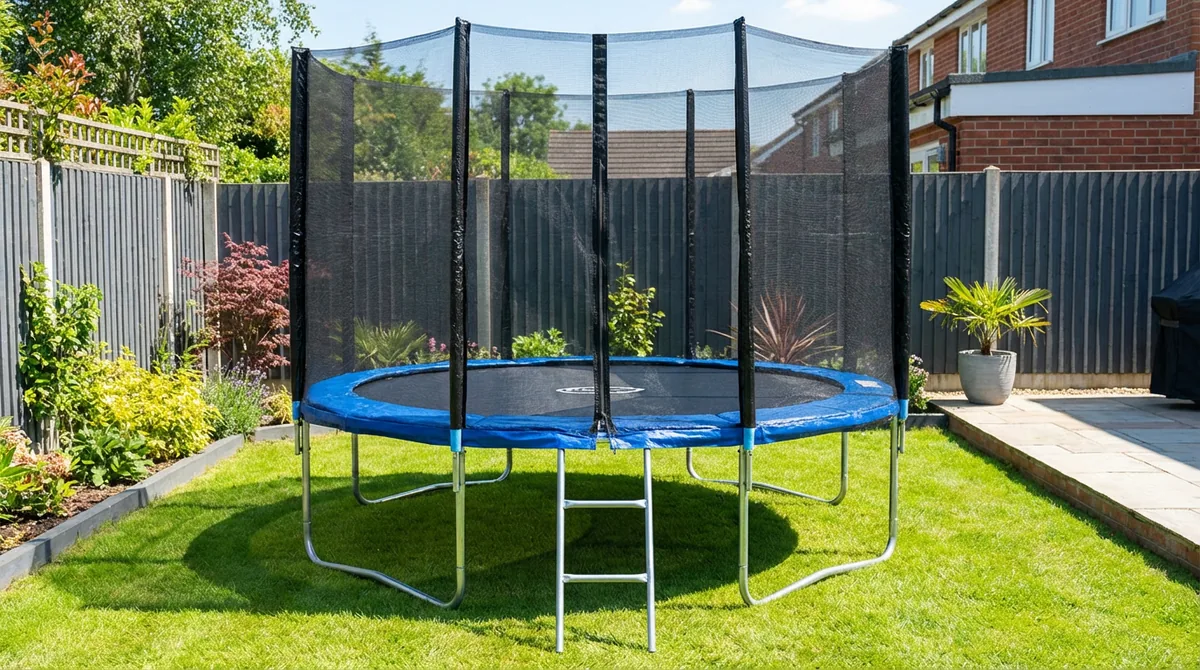 8ft Kanga round trampoline with blue padding on a UK lawn