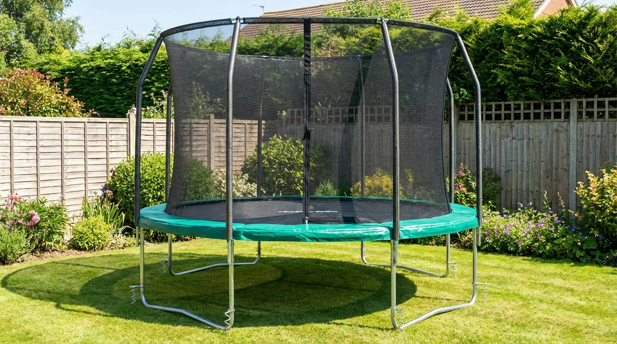 10ft Kanga round trampoline with green padding on a lawn